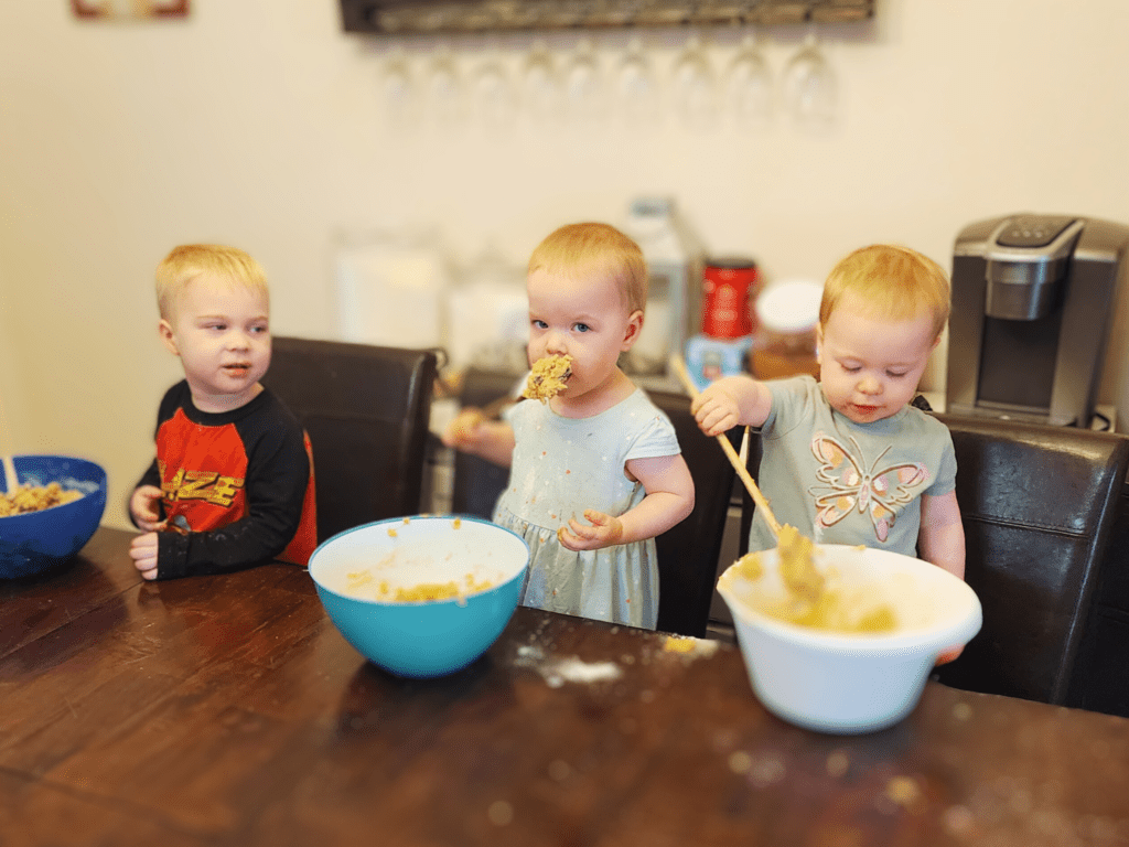 Kids baking chocolate chip cookies